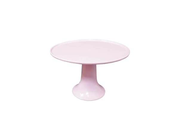 Un Suport pentru Tort Roz din Melamină S 21,5 cm rotund, roz deschis, are o bază netedă, largă și marginea ușor curbată, așezată pe un fundal alb.